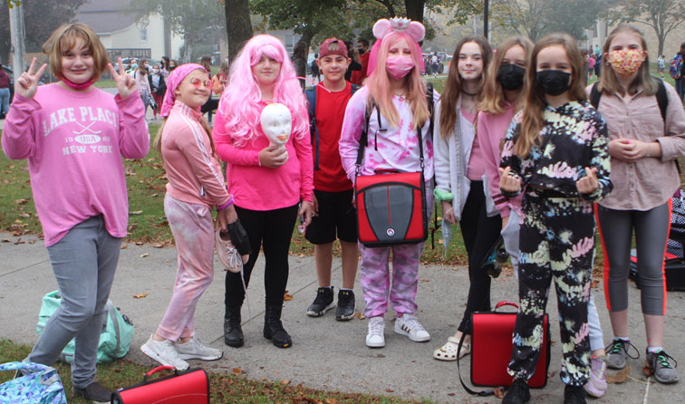 group of students dressed in pink for breast cancer awareness
