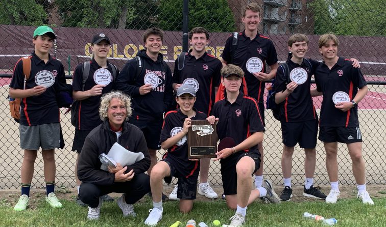 group of tennis players and coach smiling around the section 2 championship plaque they won