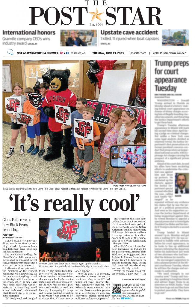Front page of the Post Star newspaper from June 13, 2023 with a big story on the Black Bear mascot reveal rally and hte headline "It's really cool" and a picture of kids smiling with the Black Bear mascot