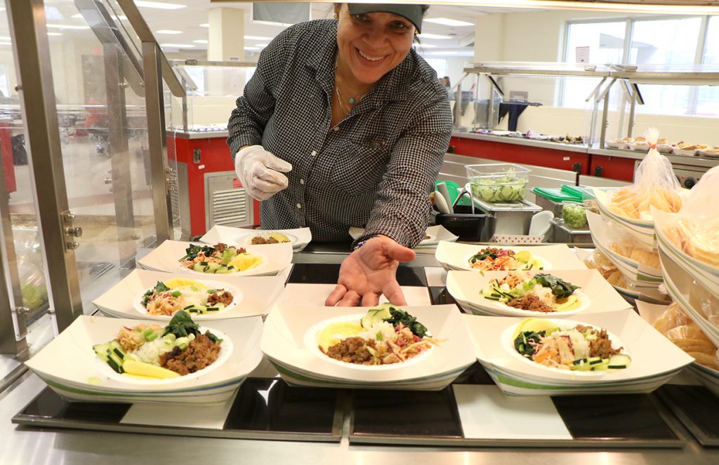 Chef Donnah serves up her specialty Korean beef bowls in the middle school cafeteria