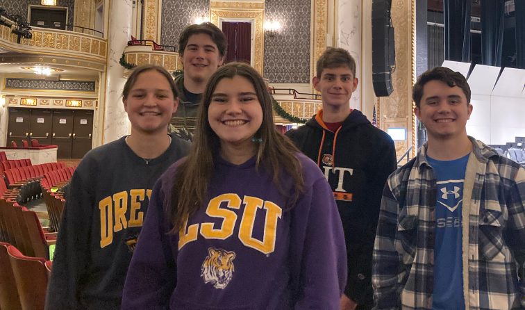 5 student-musicians inside Proctor's Theater before their rehearsal for area all-state performances